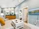 Inviting living area featuring hardwood floors, a kitchenette, and access to a bedroom at 1732 6Th St, Sarasota, FL 34236