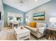 Cozy living room featuring a comfortable sofa, stylish decor, and plenty of natural light at 1732 6Th St, Sarasota, FL 34236