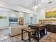 Bright living room featuring an island, an open floorplan, and stylish furnishings at 1732 6Th St, Sarasota, FL 34236