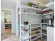 Well-organized pantry with ample shelving and storage for all your culinary needs at 1732 6Th St, Sarasota, FL 34236