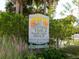 Entrance sign of Ted Sperling Park at South Lido Beach with lush greenery and park information at 1732 6Th St, Sarasota, FL 34236