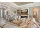Cozy living room features a stylish fireplace, comfortable seating, and elegant decor for relaxation at 17320 Polo Trl, Bradenton, FL 34211
