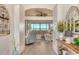 Open-concept living room featuring a cozy seating area and an open view of the outside scenery at 17320 Polo Trl, Bradenton, FL 34211