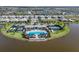 Wide aerial view of the community highlighting the pool, clubhouse, and meticulously maintained landscaping at 17823 Cherished Loop, Bradenton, FL 34211