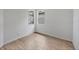Bright, airy room showcasing wood-look flooring and two windows offering natural light at 17823 Cherished Loop, Bradenton, FL 34211