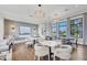 Well-lit cafe with ample seating, stylish light fixtures and floor to ceiling windows at 17823 Cherished Loop, Bradenton, FL 34211