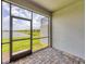 Screened in patio offering views of water, grass and other homes at 17823 Cherished Loop, Bradenton, FL 34211