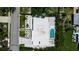 A birds eye view of the home with a pool and well-manicured landscaping at 2124 Clematis Pl, Sarasota, FL 34239
