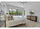 Serene bedroom suite, stylish decor, access to lanai and pool at 2124 Clematis Pl, Sarasota, FL 34239
