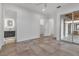 Bedroom showcasing tile flooring, recessed lighting, and a view to the bathroom and patio at 2124 Clematis Pl, Sarasota, FL 34239