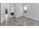 Bedroom featuring a modern design with an ensuite bathroom and a large window at 2124 Clematis Pl, Sarasota, FL 34239