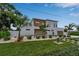 Modern house with neat landscaping, stone driveway, and a two-car garage at 2124 Clematis Pl, Sarasota, FL 34239