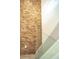 Stylish staircase with wooden accent wall and glass railing that adds modern flair at 2124 Clematis Pl, Sarasota, FL 34239