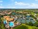 Resort-style community featuring a pool, tennis courts, and manicured grounds at 234 Padova Way, North Venice, FL 34275
