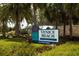 Venice Beach sign surrounded by palm trees and lush landscaping at the entrance of the park at 234 Padova Way, North Venice, FL 34275