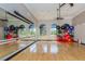 Bright and airy yoga/dance studio featuring hardwood floors, mirrors, and natural light at 234 Padova Way, North Venice, FL 34275