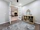 Transitional room with an open view of a Gathering room through glass paneled doors at 336 165Th Ne Ct, Bradenton, FL 34212