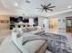 Cozy living room with plush sofa, neutral decor, and ample natural light at 336 165Th Ne Ct, Bradenton, FL 34212