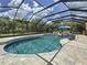 Beautiful pool and outdoor living space enclosed with a screen for bug-free enjoyment, ideal for entertaining and relaxing at 336 165Th Ne Ct, Bradenton, FL 34212