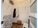 Empty walk-in closet offers custom shelving and rods, creating an opportunity for organized storage solutions at 336 165Th Ne Ct, Bradenton, FL 34212