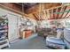 Spacious garage featuring exposed wooden beams, offering ample storage and potential living space at 336 Highland Shores Dr, Ellenton, FL 34222