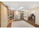 Bright bonus room with built-in shelving and skylights to provide extra natural light at 3658 Torrey Pines Way, Sarasota, FL 34238