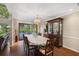 Elegant dining area with direct access to the pool area for seamless indoor/outdoor living at 3658 Torrey Pines Way, Sarasota, FL 34238