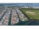 Gorgeous aerial view of a waterfront community with canals, docks, and beautiful homes, offering the ultimate coastal lifestyle at 3715 Bamboo Ter, Bradenton, FL 34210