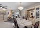 Elegant dining area featuring a crystal chandelier, and seamless flow to the living spaces at 3715 Bamboo Ter, Bradenton, FL 34210
