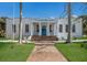 Elegant white building housing the Florida Maritime Museum, featuring a classic design with prominent columns and a welcoming entrance at 3715 Bamboo Ter, Bradenton, FL 34210