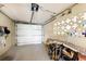 Open garage features a new garage door, a generator, and other equipment stored to the sides at 3715 Bamboo Ter, Bradenton, FL 34210