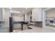 Bright kitchen with stainless steel appliances, modern countertops, backsplash, and lots of cabinet space at 3715 Bamboo Ter, Bradenton, FL 34210