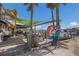 Vibrant outdoor dining space with colorful awning and string lights, creating a welcoming atmosphere at a seafood restaurant by the water at 3715 Bamboo Ter, Bradenton, FL 34210