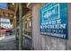 Exterior shot of Cortez Kitchen sign, advertising live entertainment and fresh seafood at 3715 Bamboo Ter, Bradenton, FL 34210