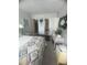 Inviting main bedroom with en suite and walk-in closet at 3806 Gulf Of Mexico Dr # C205, Longboat Key, FL 34228