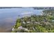 An aerial view of the property and neighborhood with lush greenery and waterfront views at 403 29Th Nw St, Bradenton, FL 34205