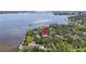 Waterfront home nestled among mature trees, offering scenic water views at 403 29Th Nw St, Bradenton, FL 34205