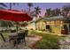 Charming backyard patio area, perfect for outdoor dining and relaxation at 403 29Th Nw St, Bradenton, FL 34205