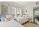 Bedroom featuring two twin beds, area rug, and wall art, perfect for guests at 403 29Th Nw St, Bradenton, FL 34205