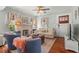 Inviting living room with hardwood floors, fireplace, and comfortable seating at 403 29Th Nw St, Bradenton, FL 34205