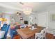 Inviting living room boasts a coffered ceiling, a large dining table, and cozy decor at 403 29Th Nw St, Bradenton, FL 34205