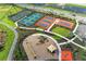 Areal view showcasing tennis courts and playground in new community at 4324 Dairy Ct, Lakewood Ranch, FL 34211