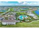 Beautiful aerial view of the community with a stunning pool and amenity center at 4324 Dairy Ct, Lakewood Ranch, FL 34211