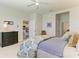 Cozy bedroom featuring neutral walls, an ensuite bathroom and a comfortable carpet at 4324 Dairy Ct, Lakewood Ranch, FL 34211
