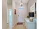 Charming entryway featuring a console table with decor and warm, inviting lighting at 4324 Dairy Ct, Lakewood Ranch, FL 34211