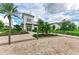 Charming building exterior with well-manicured landscaping and a brick pathway at 4324 Dairy Ct, Lakewood Ranch, FL 34211