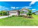 Charming single-story home with lush landscaping and well-manicured lawn at 4324 Dairy Ct, Lakewood Ranch, FL 34211