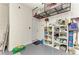 Well-organized garage featuring overhead storage, shelving, and ample space at 4324 Dairy Ct, Lakewood Ranch, FL 34211