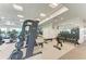 Well-equipped gym with a variety of strength training machines, weights, and mirrors at 4324 Dairy Ct, Lakewood Ranch, FL 34211