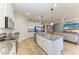 Open concept kitchen with view of living area, stainless appliances, and granite counters at 4324 Dairy Ct, Lakewood Ranch, FL 34211